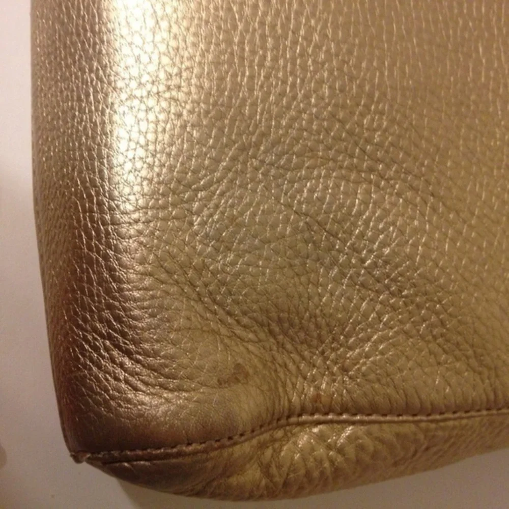 Michael Kors gold metallic leather bag